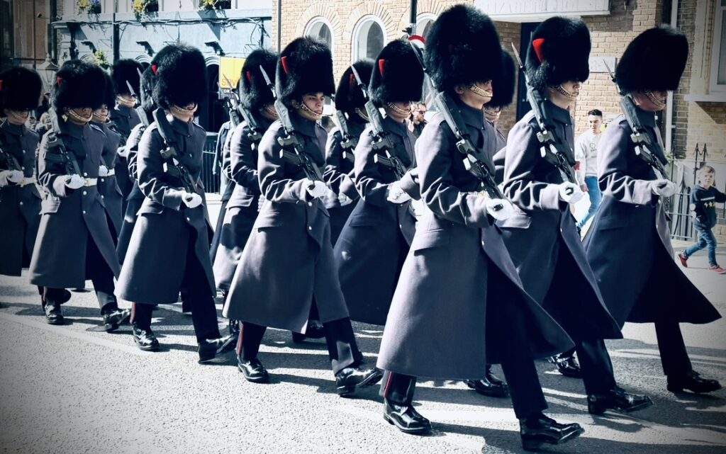 The changing of the guard at Windsor castle is a centuries old tradition.